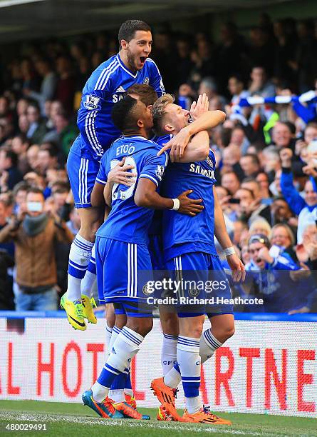 Andre Schurrle of Chelsea celebrates scoring his second goal with Nemanja Matic, Eden Hazard and Samuel Eto'o of Chelsea during the Barclays Premier...