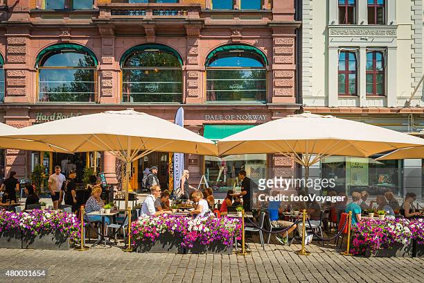 european cafe culture people enjoying al fresco dining oslo norway - oslo city life stock pictures, royalty-free photos & images