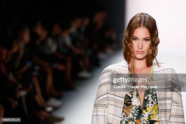 Model walks the runway at the Barre Noire presented by Mastercard show during the Mercedes-Benz Fashion Week Berlin Spring/Summer 2016 at Brandenburg...