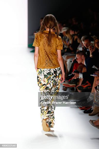 Model walks the runway at the Barre Noire presented by Mastercard show during the Mercedes-Benz Fashion Week Berlin Spring/Summer 2016 at Brandenburg...