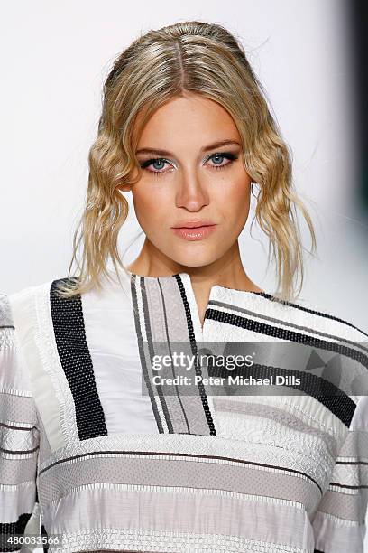 Model walks the runway at the Barre Noire presented by Mastercard show during the Mercedes-Benz Fashion Week Berlin Spring/Summer 2016 at Brandenburg...