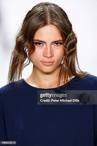 Model walks the runway at the Barre Noire presented by Mastercard show during the Mercedes-Benz Fashion Week Berlin Spring/Summer 2016 at Brandenburg...