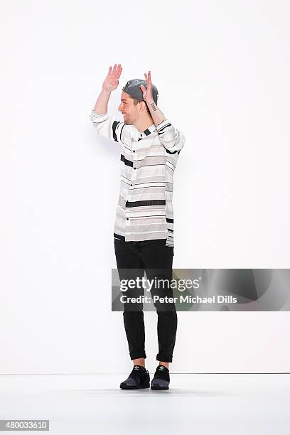 Designer Timm Suessbrich walks the runway after the Barre Noire presented by Mastercard show during the Mercedes-Benz Fashion Week Berlin...