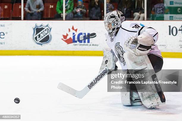 Anthony Brodeur of the Gatineau Olympiques makes a save against the Sherbrooke Phoenix during the QMJHL game on March 14, 2014 at Robert Guertin...