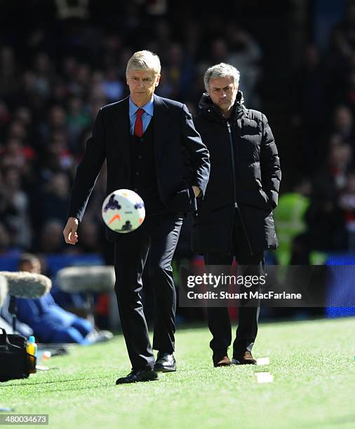 Arsenal manager Arsene Wenger and Chelsea manager Jose Mourinho during the Barclays Premier League match between Chelsea and Arsenal at Stamford...