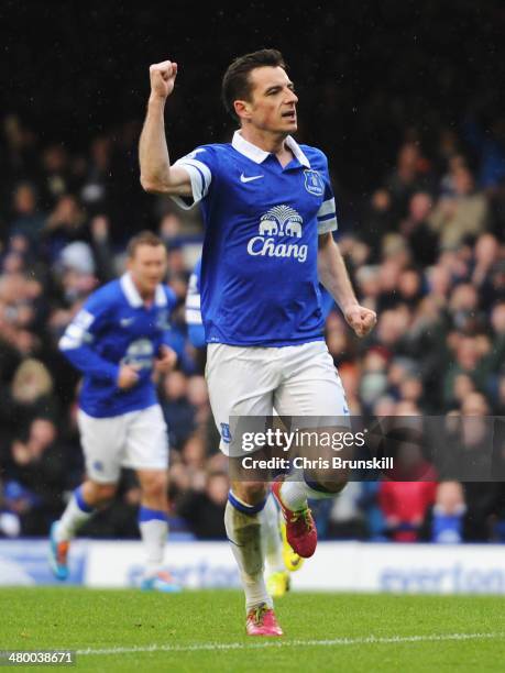 Leighton Baines of Everton celebrates scoring from the penalty spot during the Barclays Premier League match between Everton and Swansea City at...