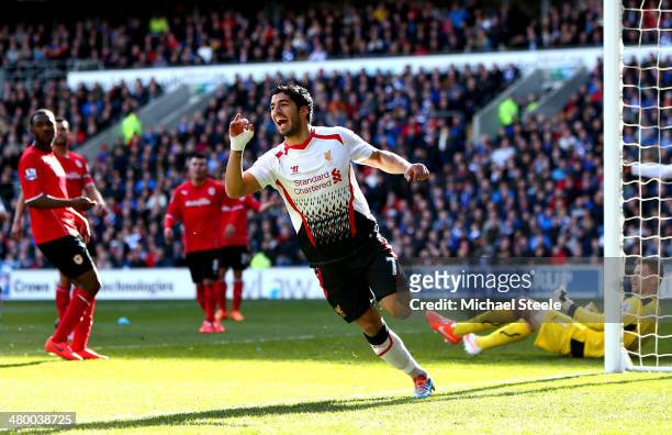 Luis Suarez of Liverpool scores a goal to level the scores at 1-1 during the Barclays Premier League match between Cardiff City and Liverpool at...