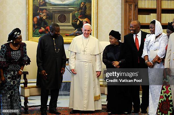 Pope Francis meets President of Nigeria Goodluck Jonathan, his wife Patience Jonathan and their delegation at his private library in the Apostolic...