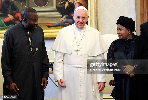 Pope Francis meets President of Nigeria Goodluck Jonathan and his wife Patience Jonathan at his private library in the Apostolic Palace on March 22,...
