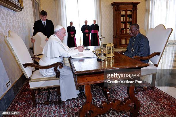 Pope Francis meets President of Nigeria Goodluck Jonathan at his private library in the Apostolic Palace on March 22, 2014 in Vatican City, Vatican....