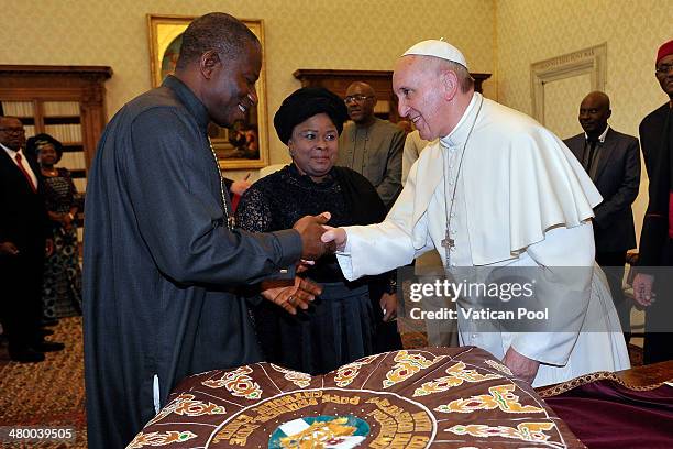 Pope Francis meets President of Nigeria Goodluck Jonathan and his wife Patience Jonathan at his private library in the Apostolic Palace on March 22,...