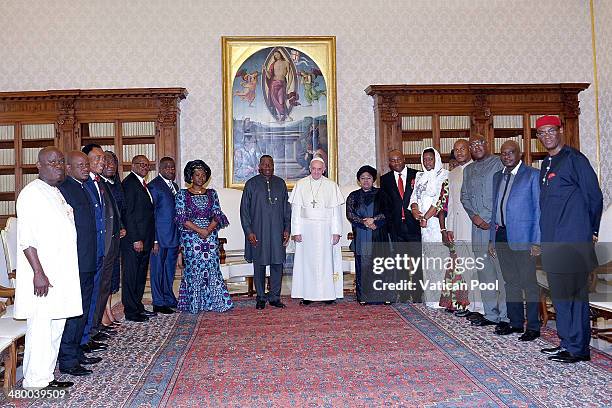 Pope Francis meets President of Nigeria Goodluck Jonathan, his wife Patience Jonathan and their delegation at his private library in the Apostolic...