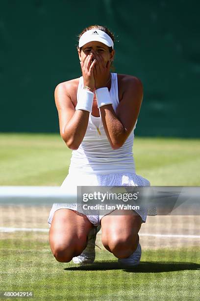 Garbine Muguruza of Spain celebrates after winning the Ladies Singles Semi Final match against Agnieszka Radwanska of Poland during day ten of the...