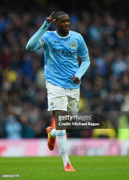 Yaya Toure of Manchester City celebrates scoring his hat trick during the Barclays Premier League match between Manchester City and Fulham at Etihad...
