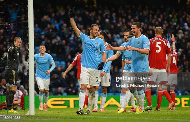 Martin Demichelis of Manchester City celebrates scoring their fifth goal with Jack Rodwell of Manchester City during the Barclays Premier League...