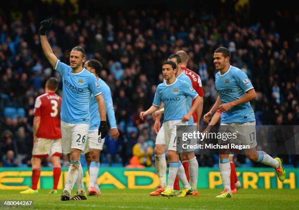 Martin Demichelis of Manchester City celebrates scoring their fifth goal with Jack Rodwell of Manchester City during the Barclays Premier League...