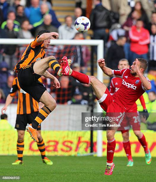 Robert Koren of Hull City competes with James Morrison of West Bromwich Albion during the Barclays Premier League match between Hull City and West...