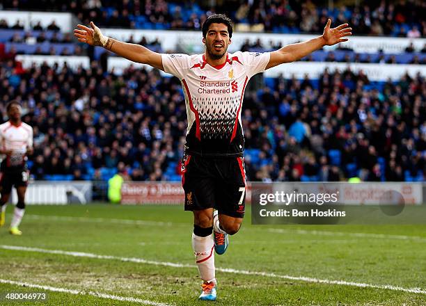 Luis Suarez of Liverpool celebrates after scoring hihs third and his team's sixth goal of the game during the Barclays Premier League match between...