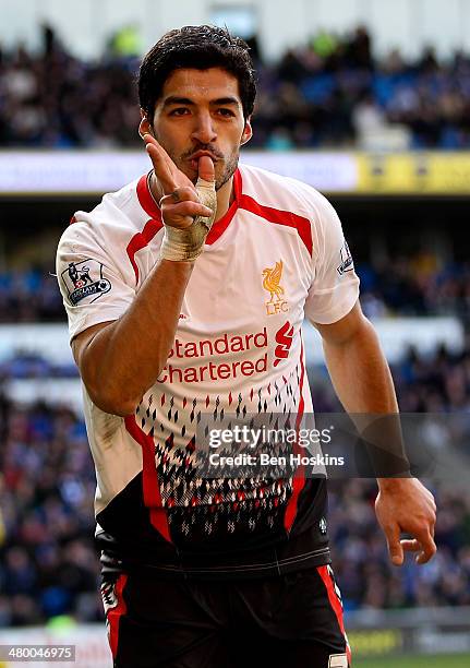 Luis Suarez of Liverpool celebrates after scoring hihs third and his team's sixth goal of the game during the Barclays Premier League match between...