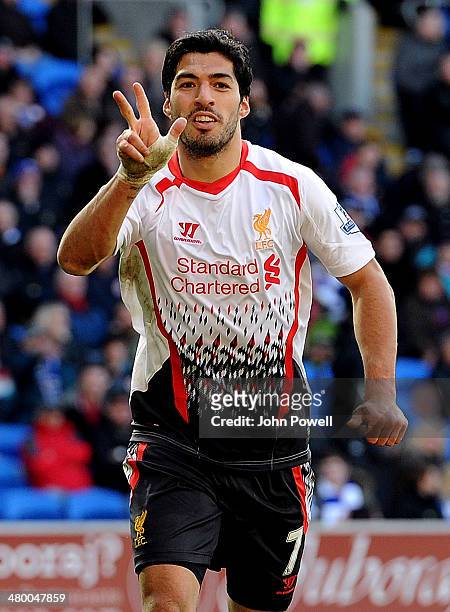 Luis Suarez of Liverpool celebrates after scoring the sixth goal and a hat-rick during the Barclays Premier League match between Cardiff City and...