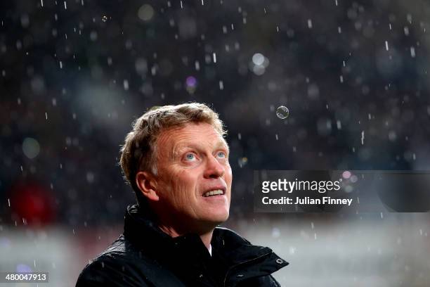 David Moyes the Manchester United manager looks on prior to kickoff during the Barclays Premier League match between West Ham United and Manchester...