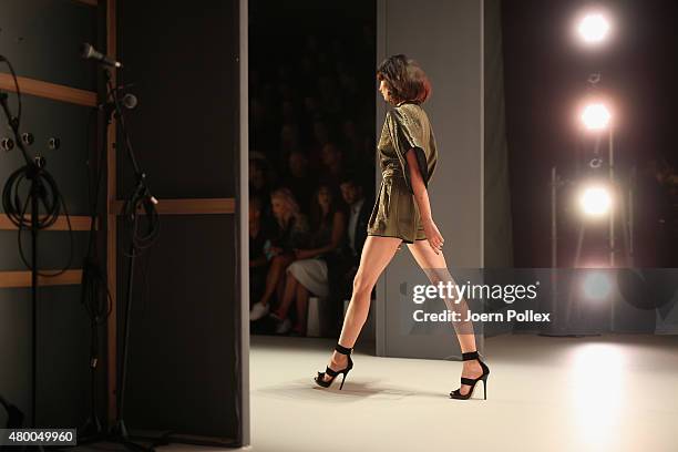 Model is seen backstage at the Dimitri show during the Mercedes-Benz Fashion Week Berlin Spring/Summer 2016 at Brandenburg Gate on July 9, 2015 in...