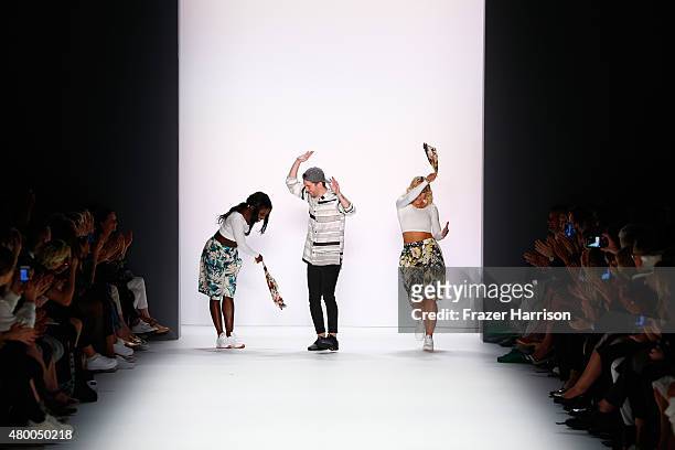 Designer Timm Suessbrich and Nikeata Thompson dance on the Barre Noire presented by Mastercard show during the Mercedes-Benz Fashion Week Berlin...