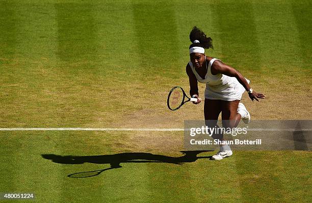 Serena Williams of the United States reacts in the Ladies Singles Semi Final match against Maria Sharapova of Russia during day ten of the Wimbledon...