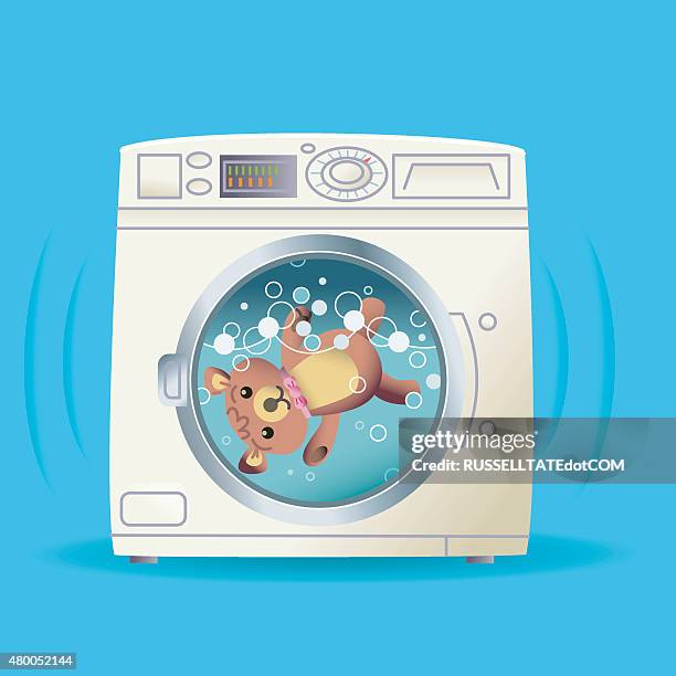 teddy in the washing machine - washing machine stock illustrations