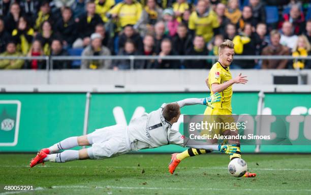 Marco Reus of Dortmund scores their third goal during the Bundesliga match between Hannover 96 and Borussia Dortmund at HDI-Arena on March 22, 2014...