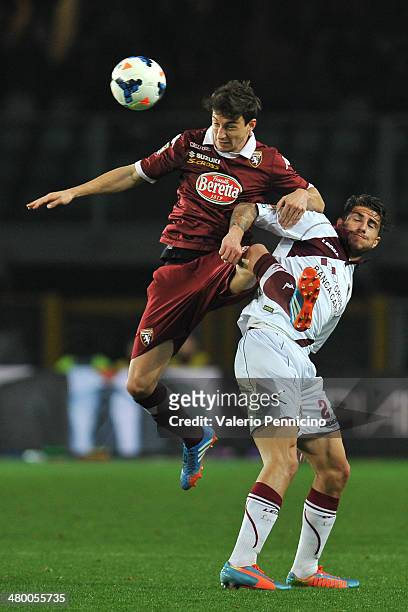 Matteo Darmian of Torino FC battles with Cristiano Piccini of AS Livorno Calcio during the Serie A match between Torino FC and AS Livorno Calcio at...