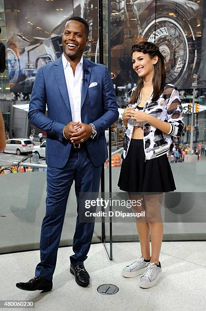 Calloway interviews Victoria Justice during her visit to 'Extra" at their New York studios at H&M in Times Square on July 9, 2015 in New York City.