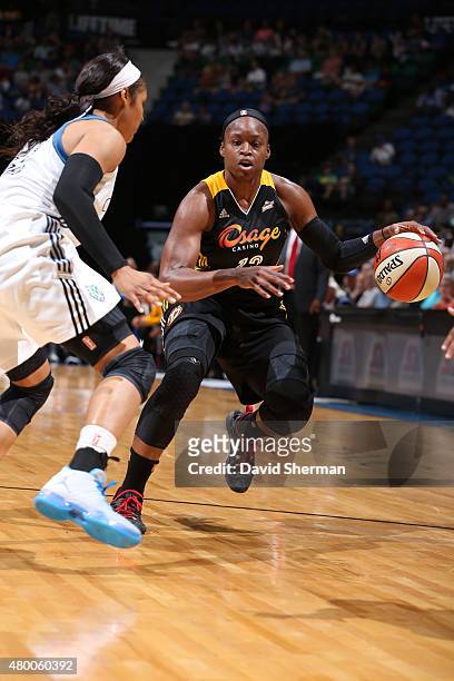 Karima Christmas of the Tulsa Shock drives against the Minnesota Lynx during the game at Target Center on June 22, 2015 in Minneapolis, Minnesota....