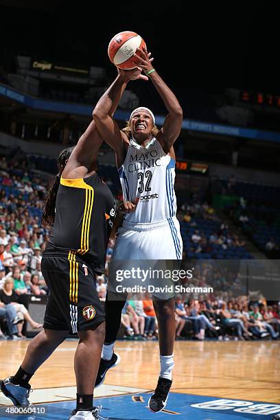 Rebekkah Brunson of the Minnesota Lynx shoots against the Tulsa Shock during the game at Target Center on June 22, 2015 in Minneapolis, Minnesota....