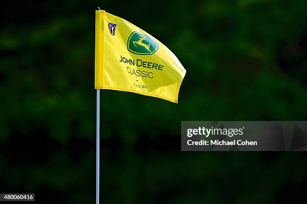 General view of a John Deere flag on the 10th green during the first round of the John Deere Classic held at TPC Deere Run on July 9, 2015 in Silvis,...