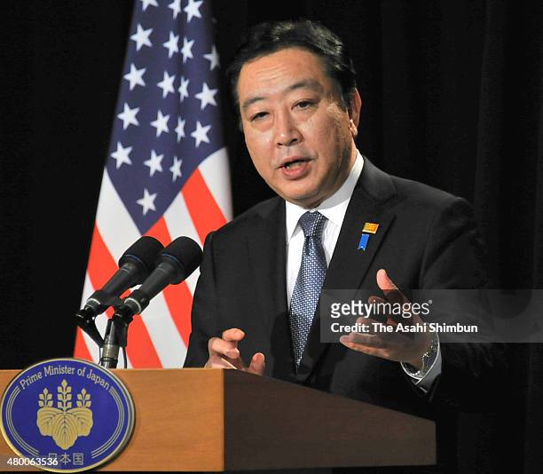 Japanese Prime Minister Yoshihiko Noda speaks during a press conference after the Asia-Pacific Economic Cooperation Summit on November 13, 2011 in...