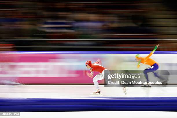 Olga Graf of Russia and Diane Valkenburg of the Netherlands compete in the 500m Ladies Race during day one of the Essent ISU World Allround Speed...