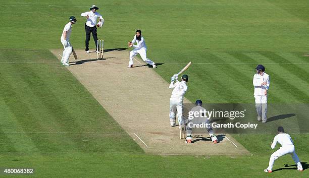 Michael Clarke of Australia is caught out by Moeen Ali of England during day two of the 1st Investec Ashes Test match between England and Australia...