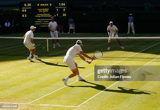 John Peers of Australia playing with partner Jamie Murray of Great Britain in the Gentlemens Doubles Semi Final match against Jonathan Erlich of...