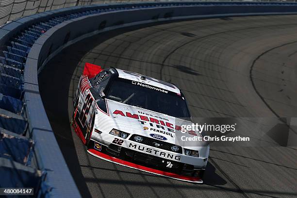 Joey Logano, driver of the America's Tire Ford, races during the NASCAR Nationwide Series TREATMYCLOT.COM 300 at Auto Club Speedway on March 22, 2014...