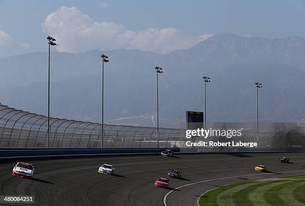 Ryan Reed, driver of the ADA Drive to Stop Diabetes presented by Lilly Diabetes Ford, leads a pack of cars during the NASCAR Nationwide Series...