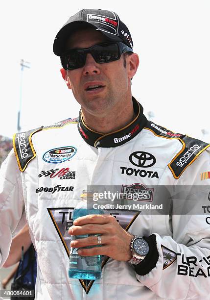 Matt Kenseth, driver of the GameStop Toyota, looks on prior to the NASCAR Nationwide Series TREATMYCLOT.COM 300 at Auto Club Speedway on March 22,...