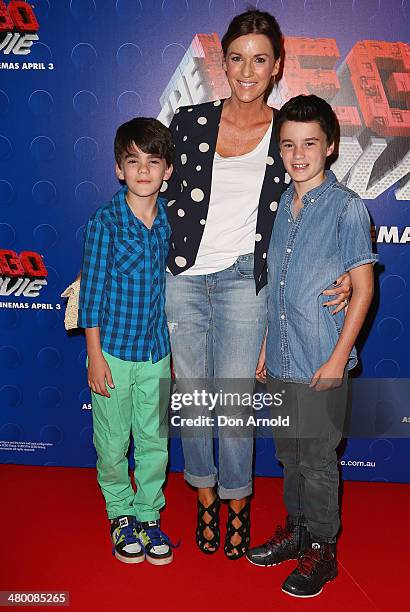 Kylie Gillies poses alongside sons Gus and Archie at the Sydney premiere of The LEGO Movie at Event Cinemas on March 23, 2014 in Sydney, Australia.