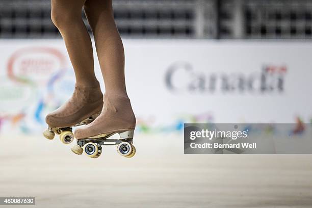 Canadian Roller Figure Skater Kailah Macri gets airborne as she practices her routine at Exhibition Centre in preparation for the Pan Am Games...