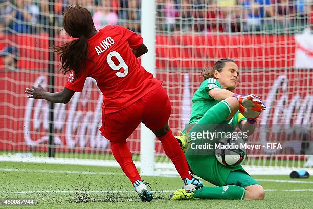 Nadine Angerer of Germany makes a save against Eniola Aluko of England during the FIFA Women's World Cup 2015 third place play-off match between...