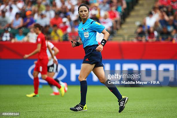 Referee Hyang Ok Ri in action during the FIFA Women's World Cup 2015 third place play-off match between Germany and England at Commonwealth Stadium...