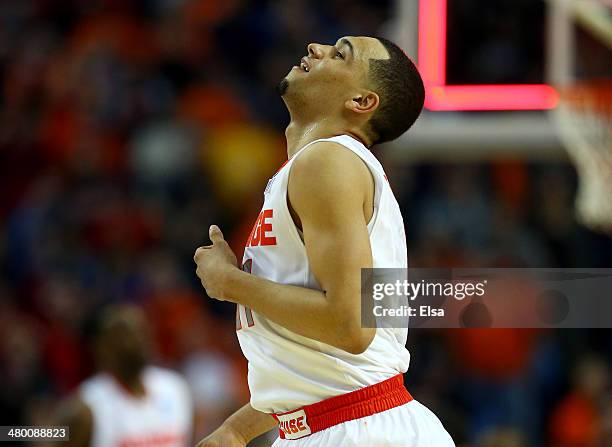 Tyler Ennis of the Syracuse Orange reacts after losing to the Dayton Flyers 55-53 in the third round of the 2014 NCAA Men's Basketball Tournament at...