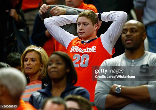 Syracuse Orange fan looks on during the third round of the 2014 NCAA Men's Basketball Tournament between the Syracuse Orange and the Dayton Flyers at...