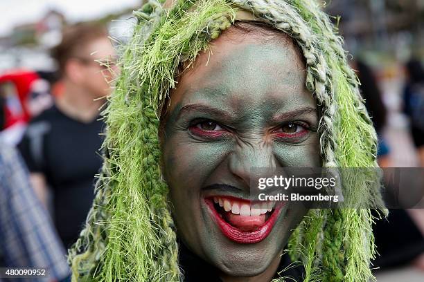 An attendee wears green face paint during the Comic-Con International convention in San Diego, California, U.S, on Thursday, July 9, 2015. Comic-Con...