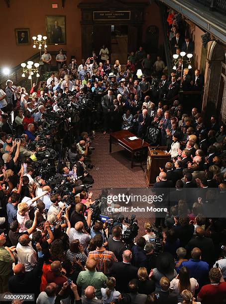 South Carolina Governor Nikki Haley signs a bill to remove the Confederate flag from the statehouse on July 9, 2015 in Columbia, South Carolina. The...